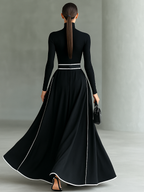 Black Maxi Dress with White Stitching, High Neck, Long Sleeves, and Fitted Belt
